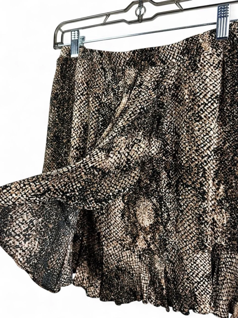 Scully black and beige snake print polyester mini skirt with ruffle hem